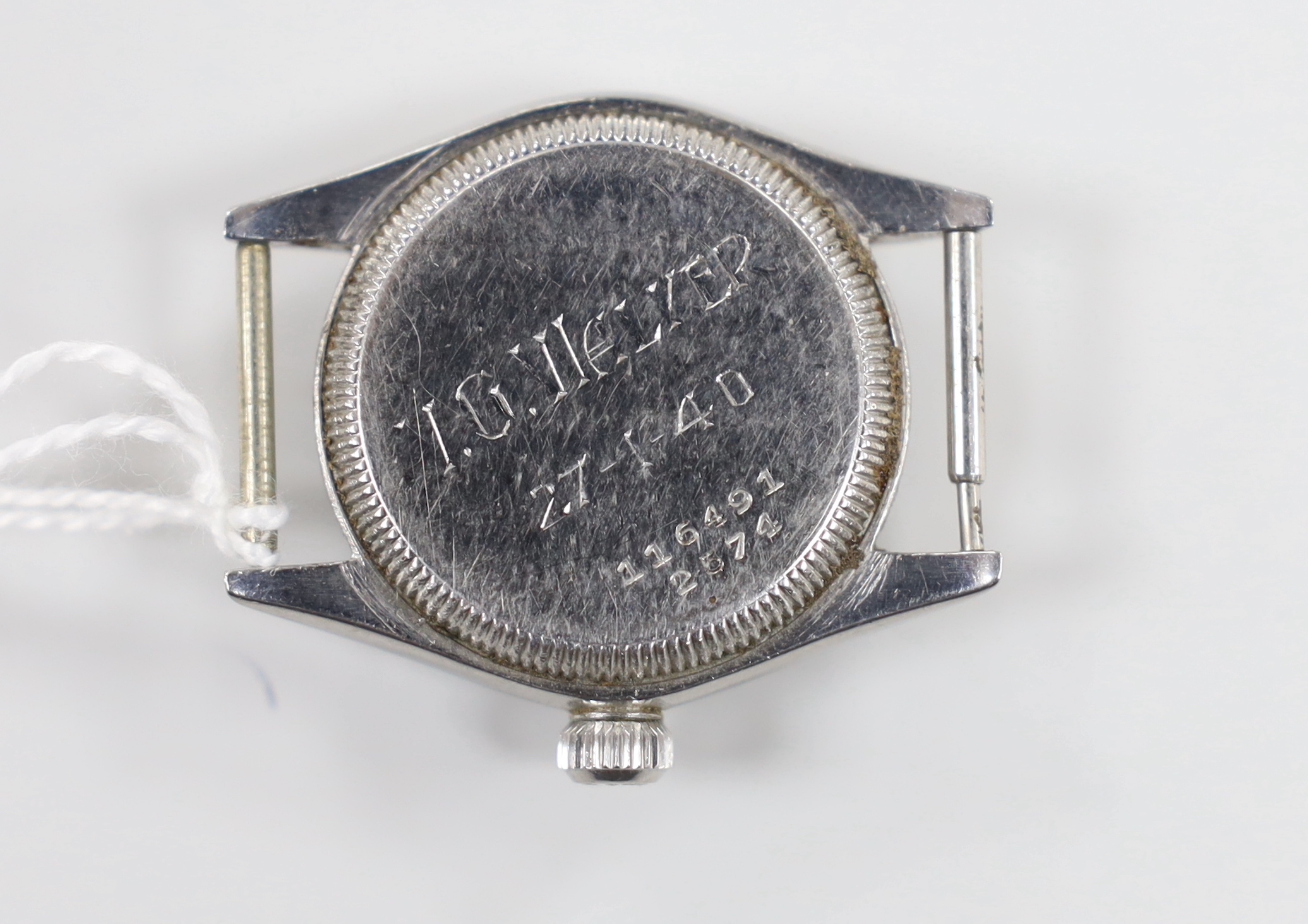 A 1940's boy's size stainless steel Rolex Oyster manual wind wrist watch, no strap, case diameter 30mm, with case back inscription.